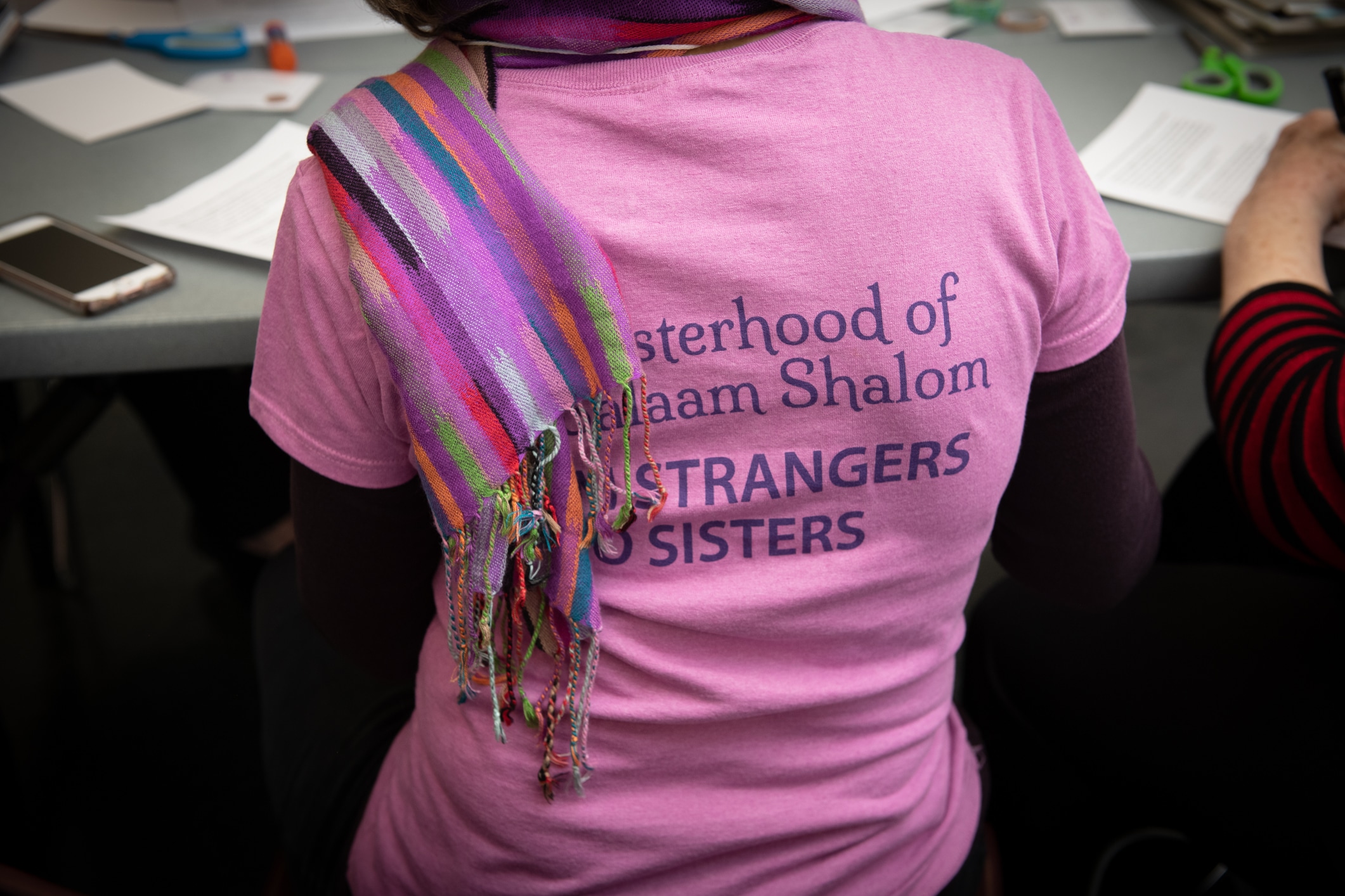 Sisterhood of Salaam Shalom t-shirt and scarf, reading, from strangers to sisters