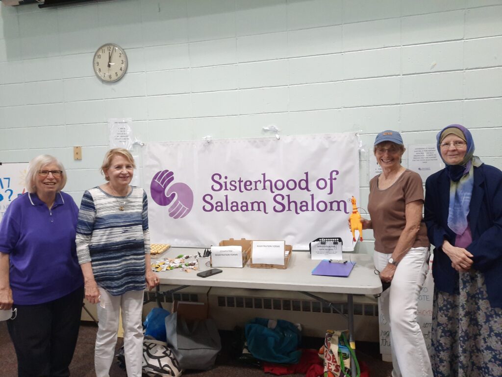 Sisterhood chapter memers encouraging students to register to vote